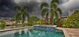storm clouds over Florida pool